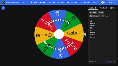 The Wheel of Names website has a large wheel in the center of the page. There is a textbox with names on the right, and those names are reflected as colored sections on the wheel.
